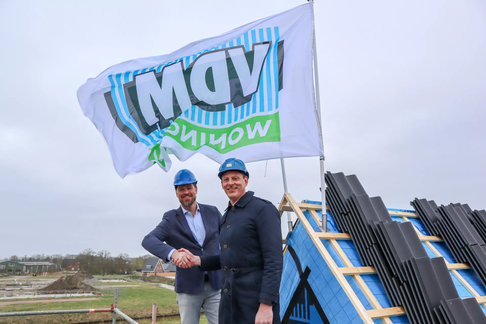 Vlag in top bouw woningen Winsum