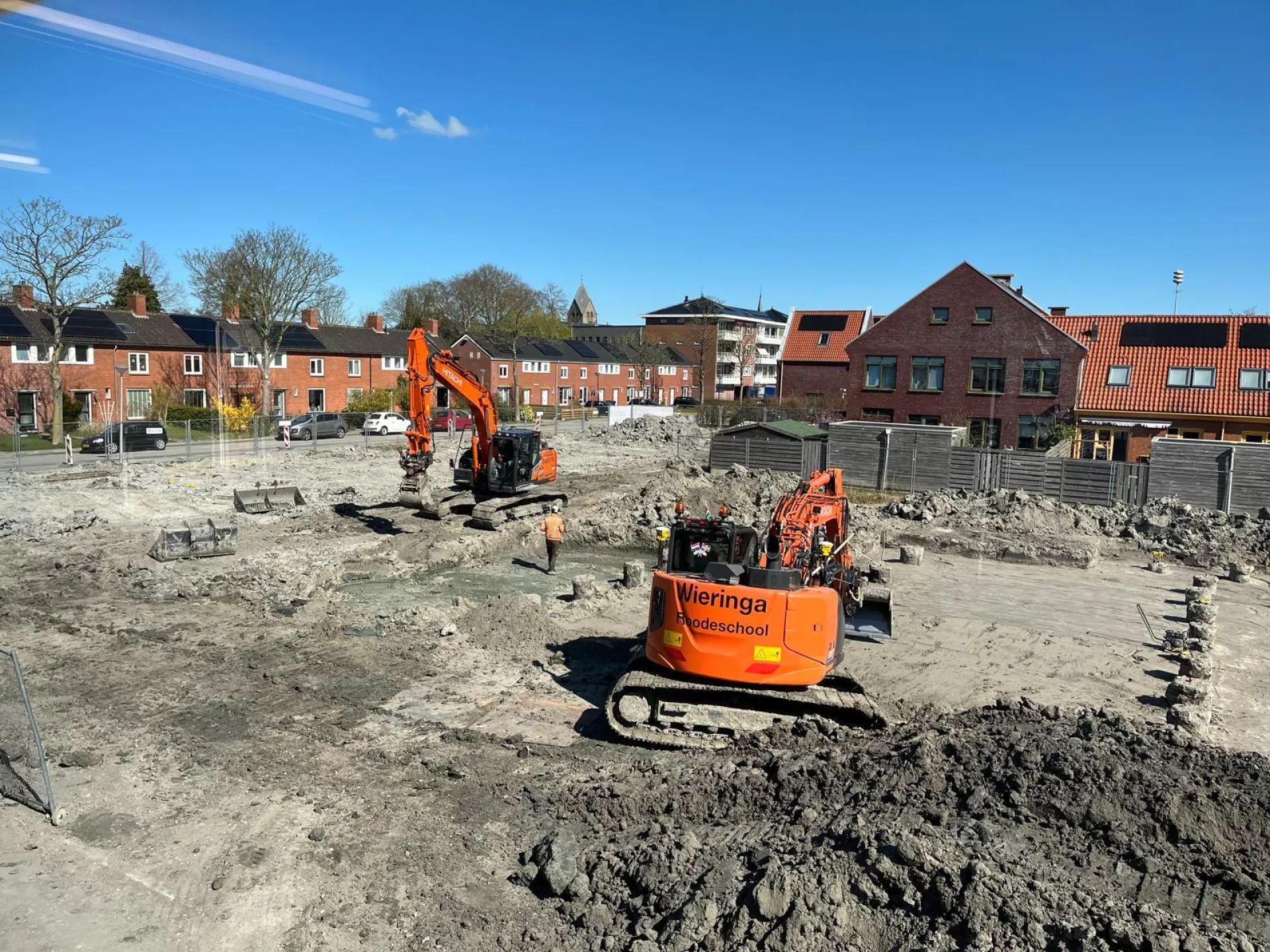 Kranen maken terrein bouwrijp