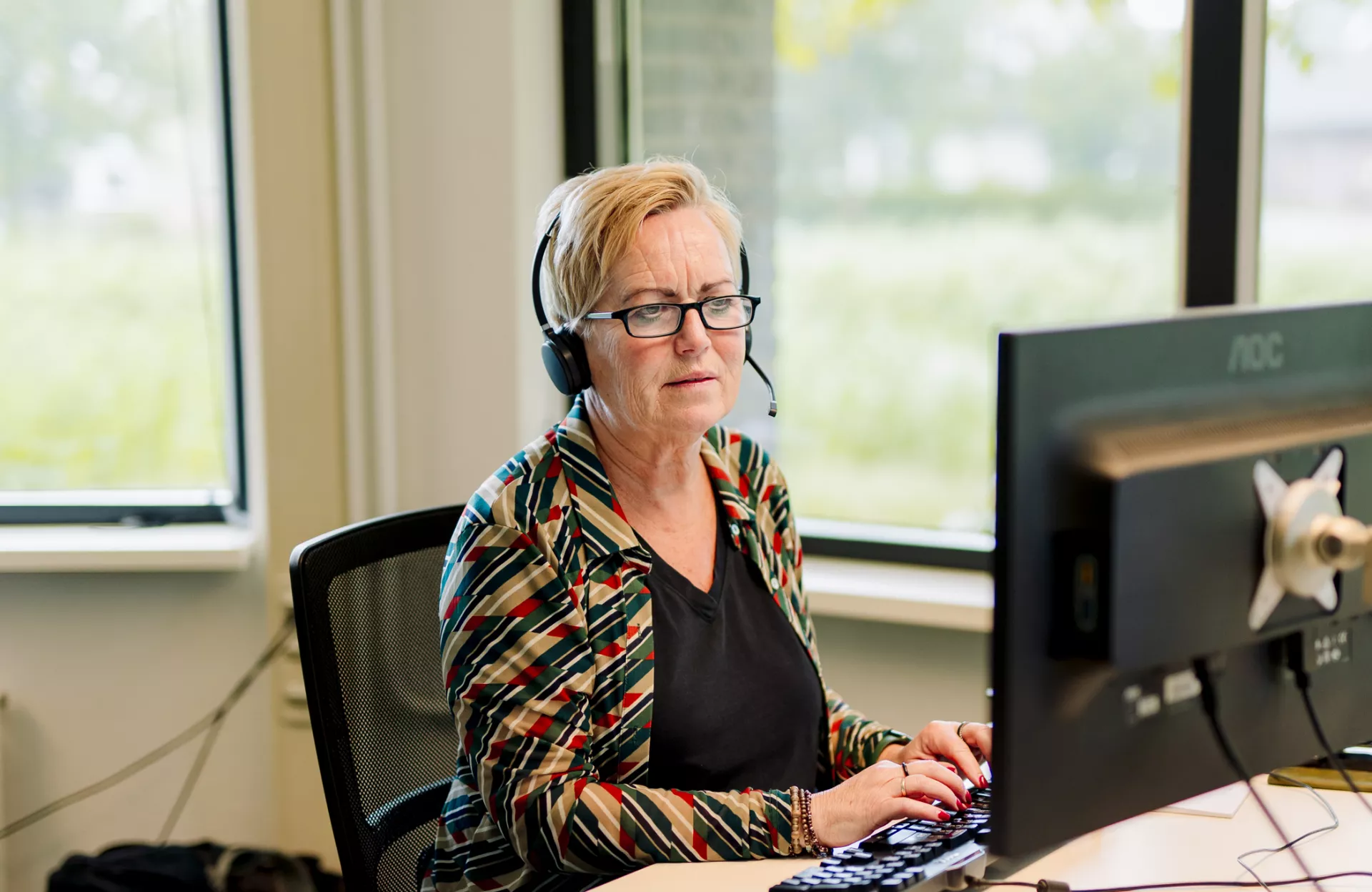 Medewerker Woonpunt belt